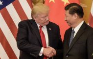 China says it has made plans with the US for a face-to-face trade meeting in January
